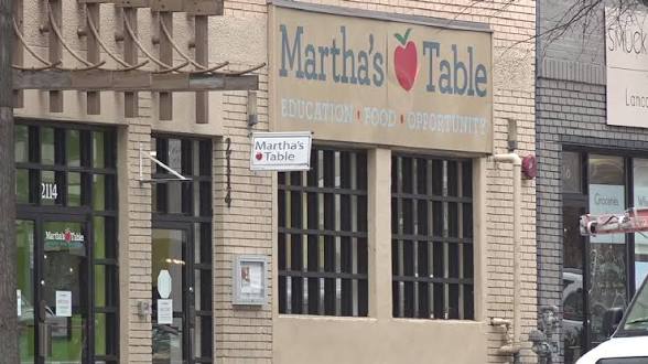 The Martha&rsquo;s Table storefront on 14th Street NW, sign reading Education, Food, Opportunity