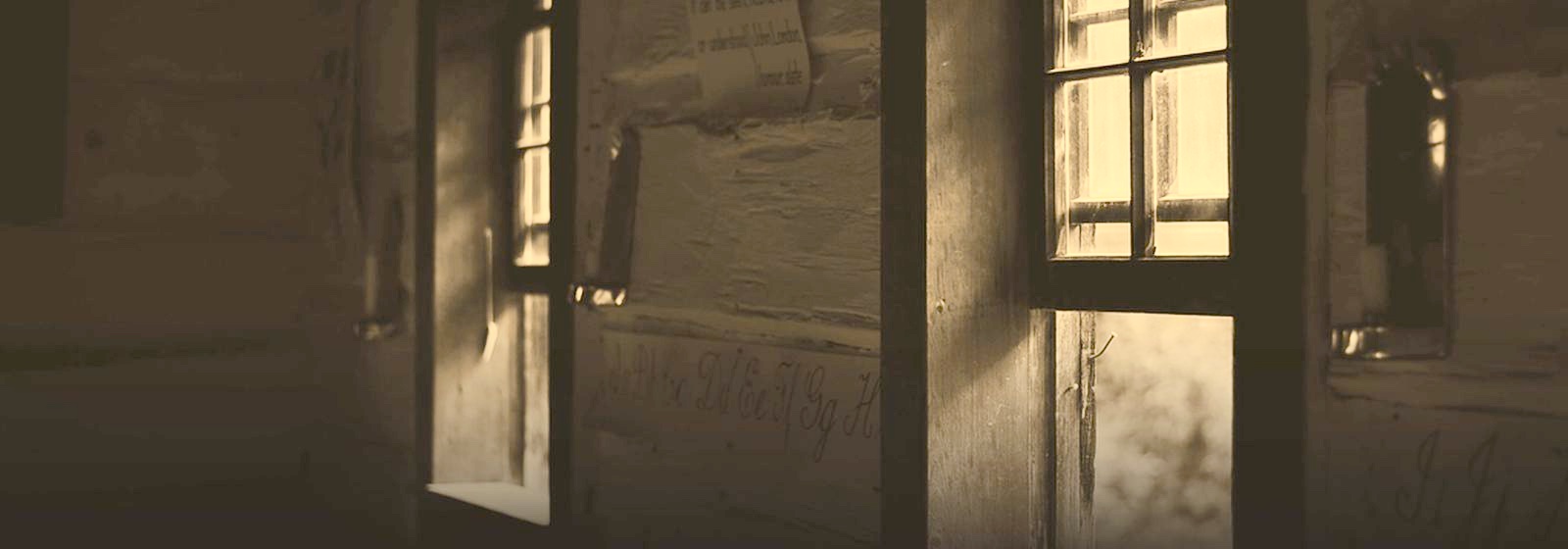 Morning light through the windows of an old schoolroom