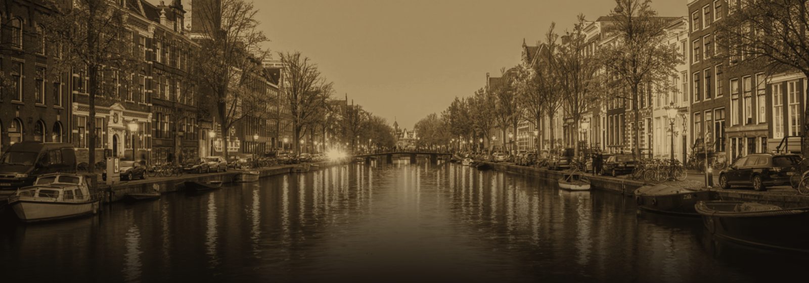 A canal in Amsterdam at dusk