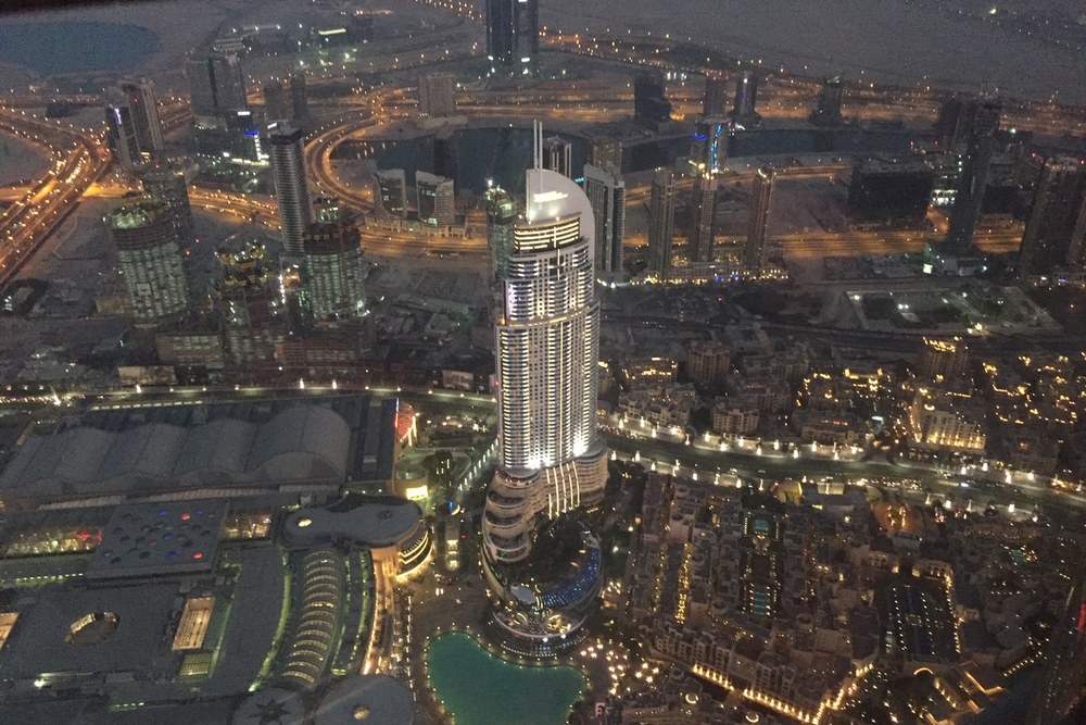 Downtown Dubai at night from the top of the Burj Khalifa, photographed by Michael Olaiya